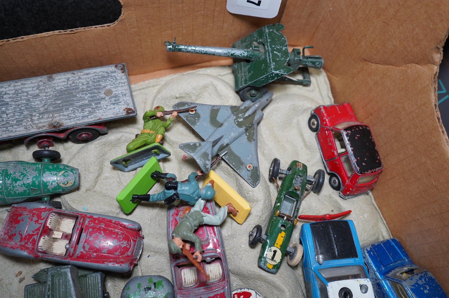 A collection of approximately ninety Dinky Toys, Corgi Toys, Matchbox Series, etc. for restoration, comprising of 1950s to 1970s diecast models of cars, commercial vehicles, military vehicles, etc. Condition - poor, most